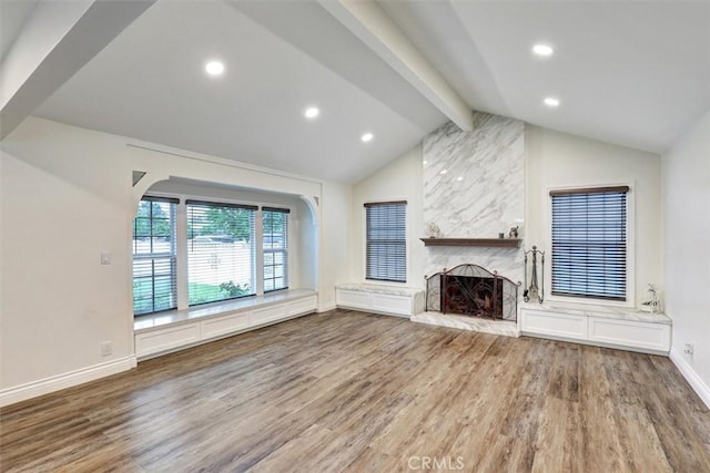 12081 Martha Ann Dr, Los Alamitos, CA 90720 - unfurnished living room featuring wood finished floors, baseboards, a fireplace, and recessed lighting