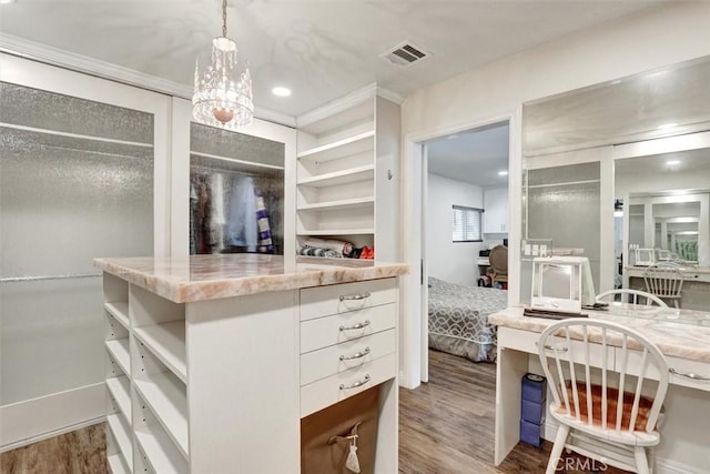 12081 Martha Ann Dr, Los Alamitos, CA 90720 - spacious closet with wood finished floors