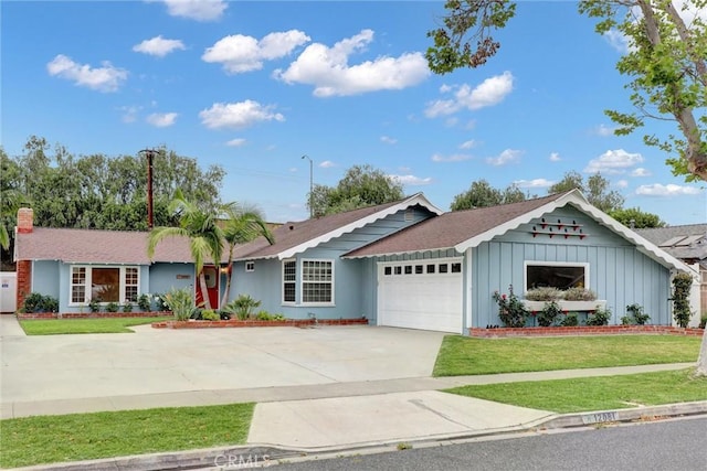 12081 Martha Ann Dr, Los Alamitos, CA 90720 - ranch-style house with an attached garage, driveway, board and batten siding, and a front yard