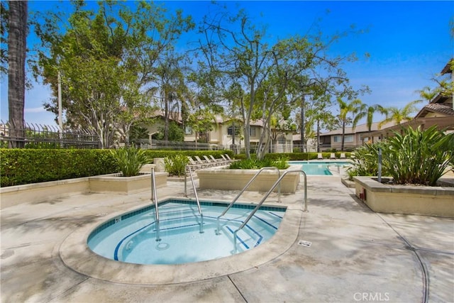 19 Tierra Montanosa, Rancho Santa Margarita, CA 92688 - community pool featuring a community hot tub and a patio
