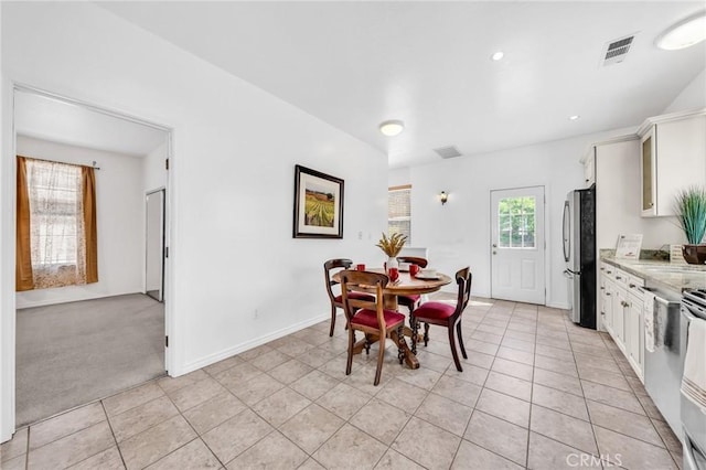 1107 Tennent Ave, Pinole, CA 94564 - dining room with light tile patterned flooring, baseboards, recessed lighting, and light carpet