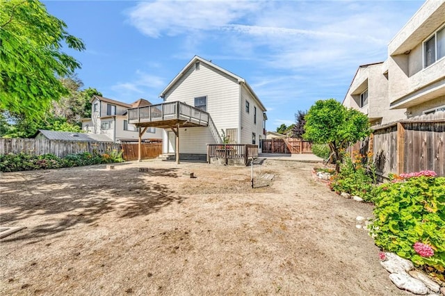 1107 Tennent Ave, Pinole, CA 94564 - rear view of property with a fenced backyard and a deck
