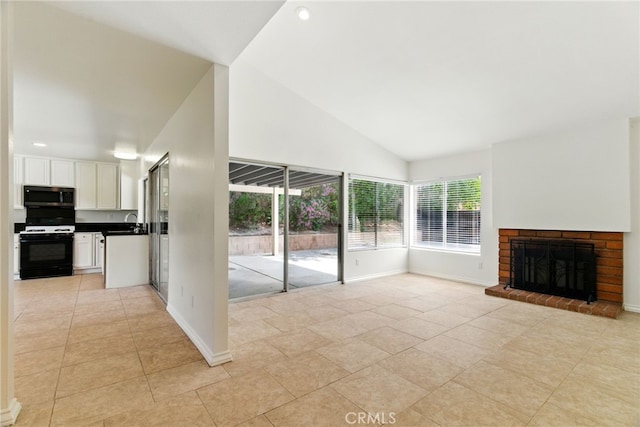 11340 Reseda Blvd, Porter Ranch, CA 91326 - unfurnished living room with a sink, a fireplace, baseboards, recessed lighting, and lofted ceiling
