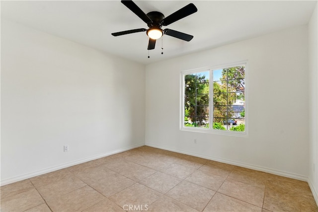 11340 Reseda Blvd, Porter Ranch, CA 91326 - empty room featuring light tile patterned flooring, baseboards, and ceiling fan