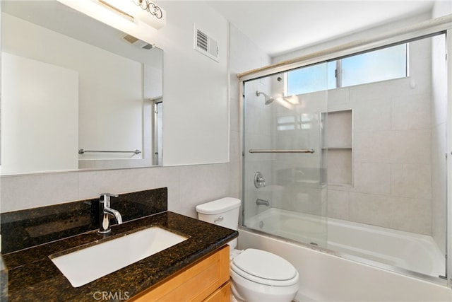 11340 Reseda Blvd, Porter Ranch, CA 91326 - full bath featuring toilet, vanity, and bath / shower combo with glass door