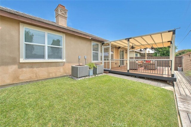 4451 Terry St, Chino, CA 91710 - view of yard featuring a deck and cooling unit