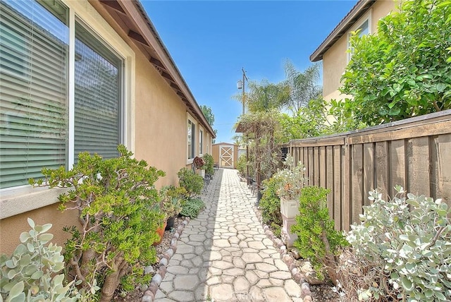 4451 Terry St, Chino, CA 91710 - view of side of property featuring stucco siding and a fenced backyard