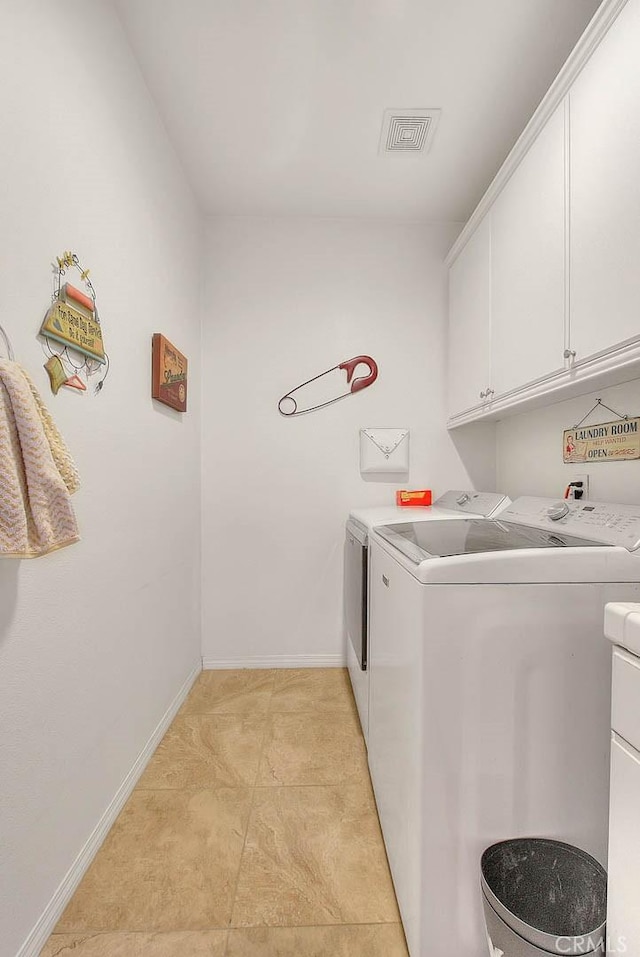 4451 Terry St, Chino, CA 91710 - laundry area with cabinet space, washing machine and dryer, and baseboards
