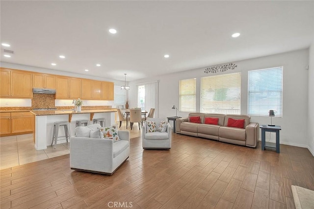 4451 Terry St, Chino, CA 91710 - living room with light wood-style flooring, recessed lighting, and baseboards