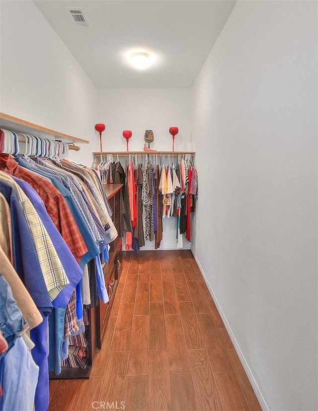 4451 Terry St, Chino, CA 91710 - walk in closet featuring wood finished floors