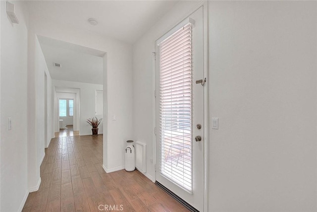 4451 Terry St, Chino, CA 91710 - hall with light wood finished floors and baseboards