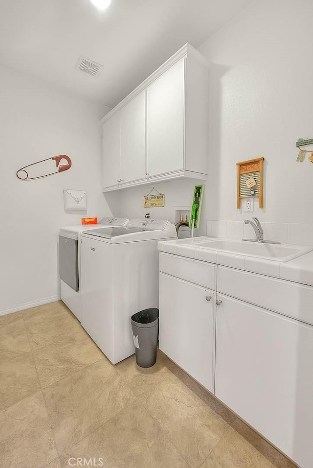4451 Terry St, Chino, CA 91710 - washroom featuring cabinet space and washing machine and dryer