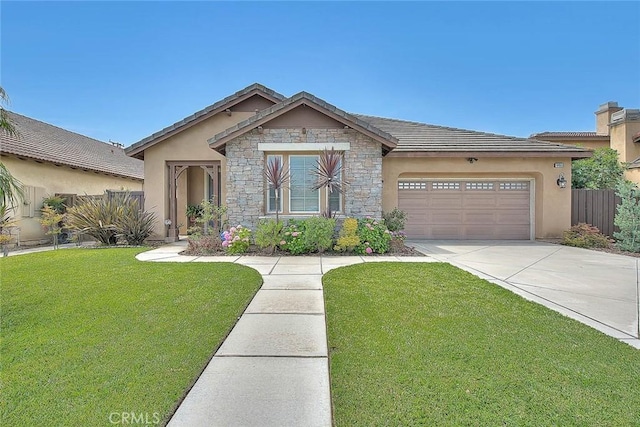 4451 Terry St, Chino, CA 91710 - view of front facade featuring concrete driveway, an attached garage, stone siding, and stucco siding