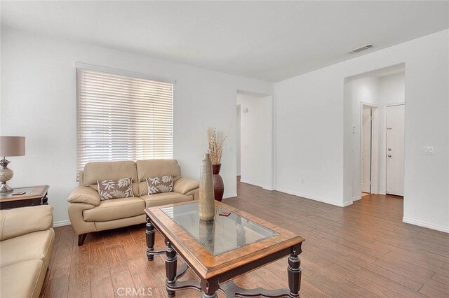 4451 Terry St, Chino, CA 91710 - living room featuring wood finished floors and baseboards