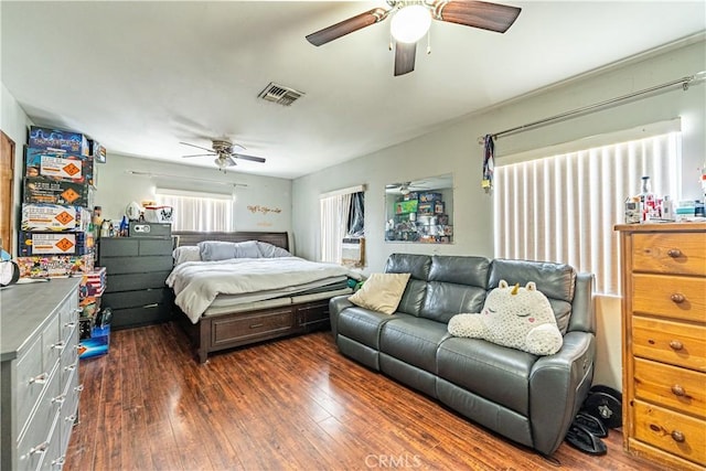 4639 Pine St, Pico Rivera, CA 90660 - bedroom featuring dark wood finished floors and ceiling fan