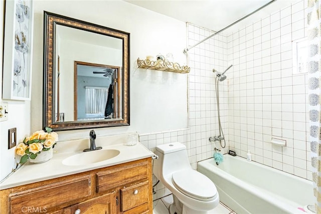 4639 Pine St, Pico Rivera, CA 90660 - bathroom with shower / bath combo with shower curtain, vanity, and tile walls