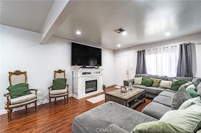 4639 Pine St, Pico Rivera, CA 90660 - living area featuring recessed lighting, dark wood-style floors, and a fireplace