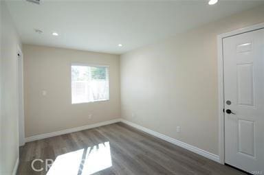 5919 Cantaloupe Ave, Valley Glen, CA 91401 - unfurnished bedroom featuring wood finished floors and recessed lighting