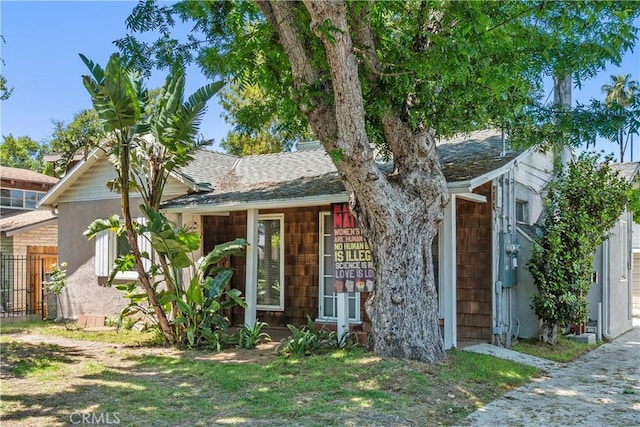 5919 Cantaloupe Ave, Valley Glen, CA 91401 - view of front of house with a shingled roof