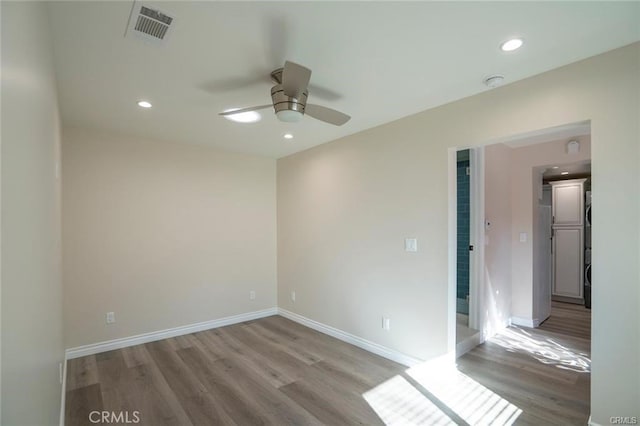 5919 Cantaloupe Ave, Valley Glen, CA 91401 - empty room with wood finished floors, ceiling fan, recessed lighting, and a smoke detector