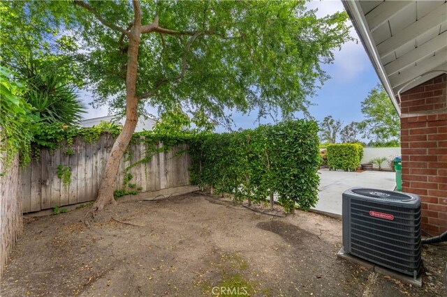 4252 Brookside St, Irvine, CA 92604 - fenced backyard featuring central AC and a patio area