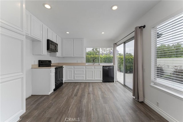 4252 Brookside St, Irvine, CA 92604 - kitchen featuring black appliances, a sink, dark wood-style floors, and recessed lighting