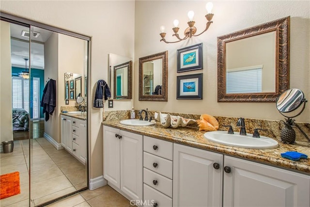 2012 Melbourne Cir, Banning, CA 92220 - bathroom featuring double vanity and tile patterned floors