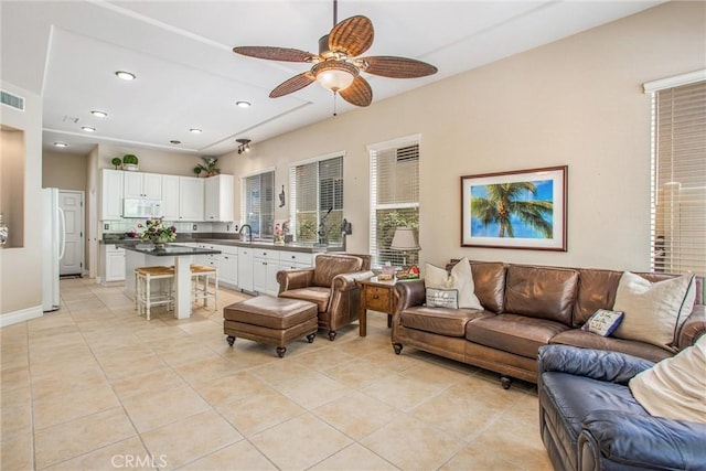 2012 Melbourne Cir, Banning, CA 92220 - living room featuring light tile patterned flooring, a ceiling fan, and recessed lighting