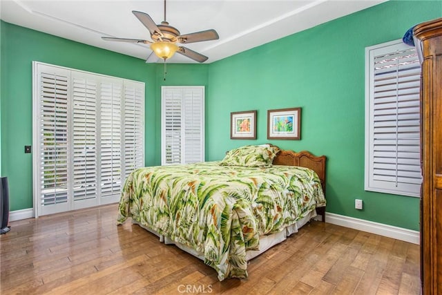 2012 Melbourne Cir, Banning, CA 92220 - bedroom featuring hardwood / wood-style flooring, baseboards, and ceiling fan
