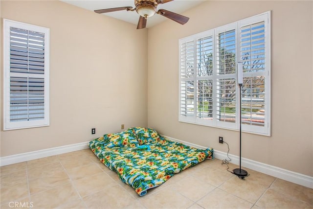 2012 Melbourne Cir, Banning, CA 92220 - unfurnished bedroom with tile patterned flooring and a ceiling fan