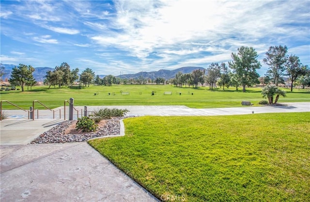 2012 Melbourne Cir, Banning, CA 92220 - view of home's community featuring a mountain view and a yard