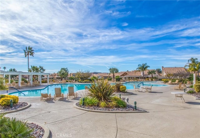 2012 Melbourne Cir, Banning, CA 92220 - community pool with a pergola and a patio area
