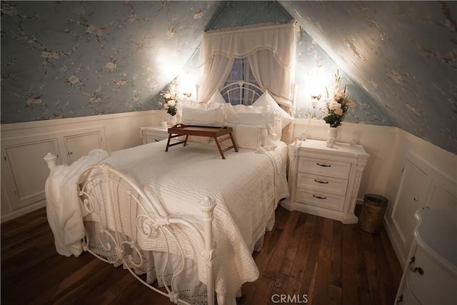 26335 Forest Ln, Twin Peaks, CA 92391 - bedroom with wallpapered walls, a wainscoted wall, dark wood-style floors, and a decorative wall