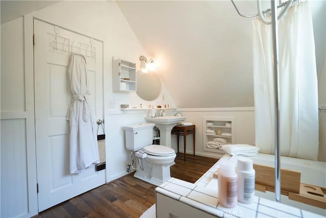 26335 Forest Ln, Twin Peaks, CA 92391 - bathroom with lofted ceiling, wood finished floors, and curtained shower