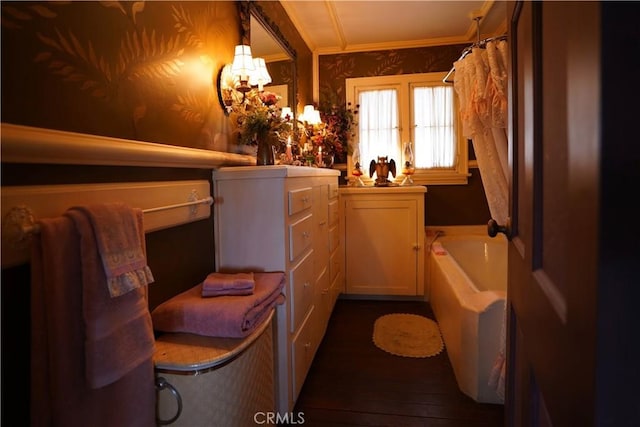 26335 Forest Ln, Twin Peaks, CA 92391 - full bath featuring wallpapered walls, a garden tub, ornamental molding, hardwood / wood-style flooring, and a chandelier