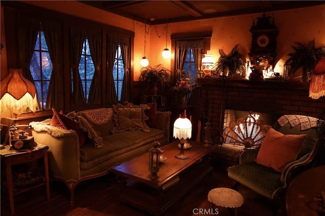 26335 Forest Ln, Twin Peaks, CA 92391 - living area featuring wood finished floors, a brick fireplace, and beamed ceiling