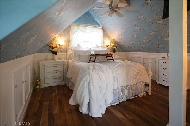 26335 Forest Ln, Twin Peaks, CA 92391 - bedroom featuring dark wood-style flooring, wallpapered walls, a wainscoted wall, lofted ceiling, and a decorative wall