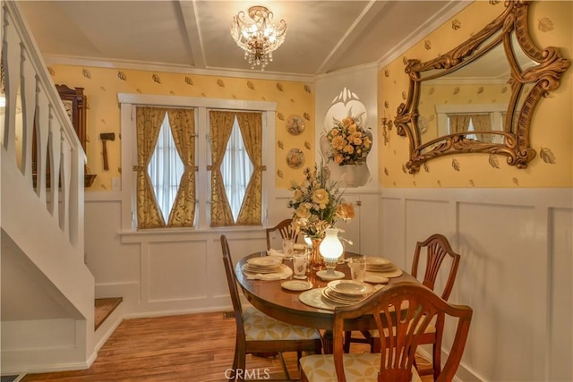 26335 Forest Ln, Twin Peaks, CA 92391 - dining room featuring a decorative wall, stairway, wood finished floors, ornamental molding, and a wainscoted wall