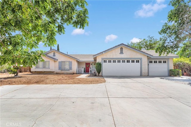 16229 Lake View Ln, Apple Valley, CA 92307 - single story home with an attached garage, concrete driveway, stucco siding, and a tile roof