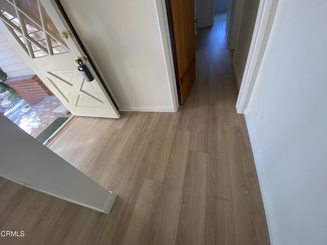 10315 Mcbroom St, Sunland, CA 91040 - corridor featuring wood finished floors and baseboards