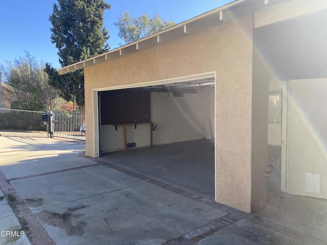 10315 Mcbroom St, Sunland, CA 91040 - garage with concrete driveway and a gate