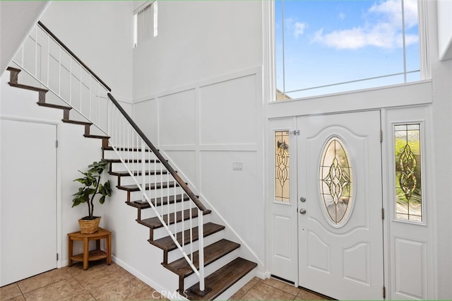 4354 Avenida Prado, Thousand Oaks, CA 91360 - entryway featuring stairway, light tile patterned floors, and a high ceiling