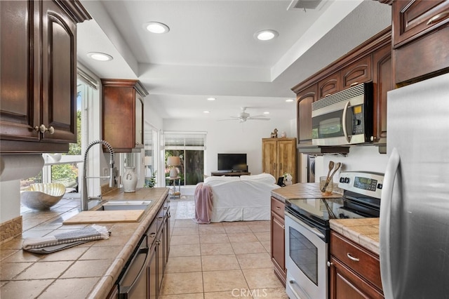 4354 Avenida Prado, Thousand Oaks, CA 91360 - kitchen with appliances with stainless steel finishes, tile counters, a sink, healthy amount of natural light, and recessed lighting