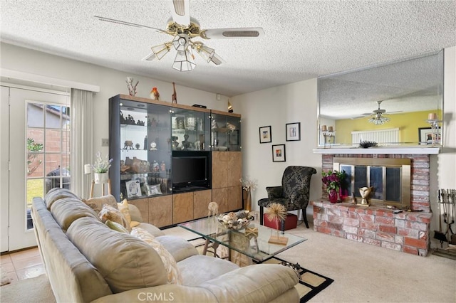1601 163rd St W, Compton, CA 90220 - living area with ceiling fan, a brick fireplace, a textured ceiling, and carpet flooring
