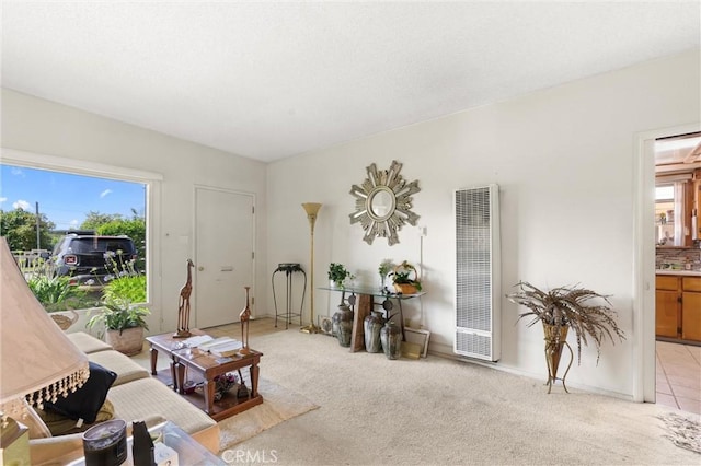 1601 163rd St W, Compton, CA 90220 - living area featuring a heating unit and light colored carpet