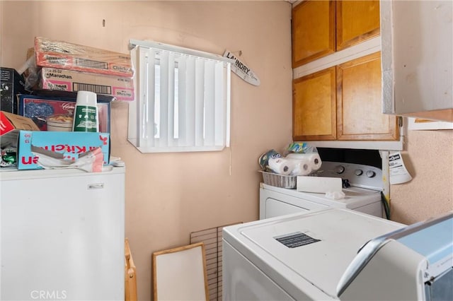 1601 163rd St W, Compton, CA 90220 - laundry room featuring cabinet space and separate washer and dryer