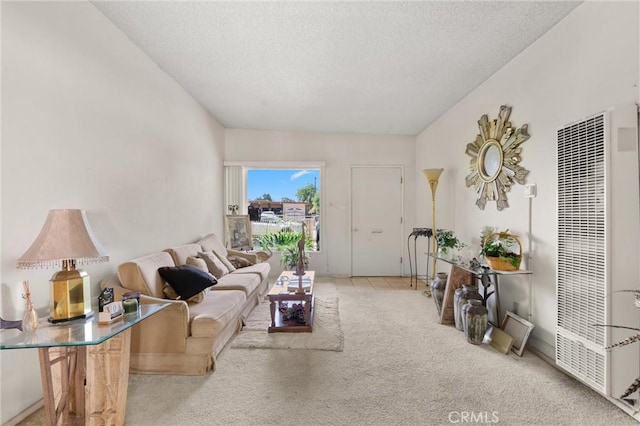 1601 163rd St W, Compton, CA 90220 - living area featuring a heating unit, carpet, and a textured ceiling
