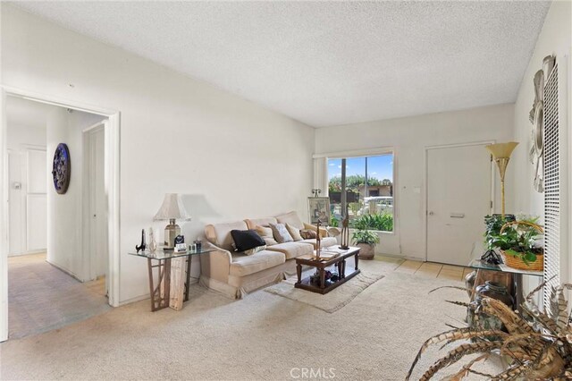 1601 163rd St W, Compton, CA 90220 - carpeted living room with a textured ceiling