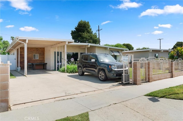 1601 163rd St W, Compton, CA 90220 - view of front of house with a carport and concrete driveway