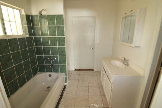 614 W 60th St, Los Angeles, CA 90044 - full bath with tile patterned floors, vanity, and  shower combination